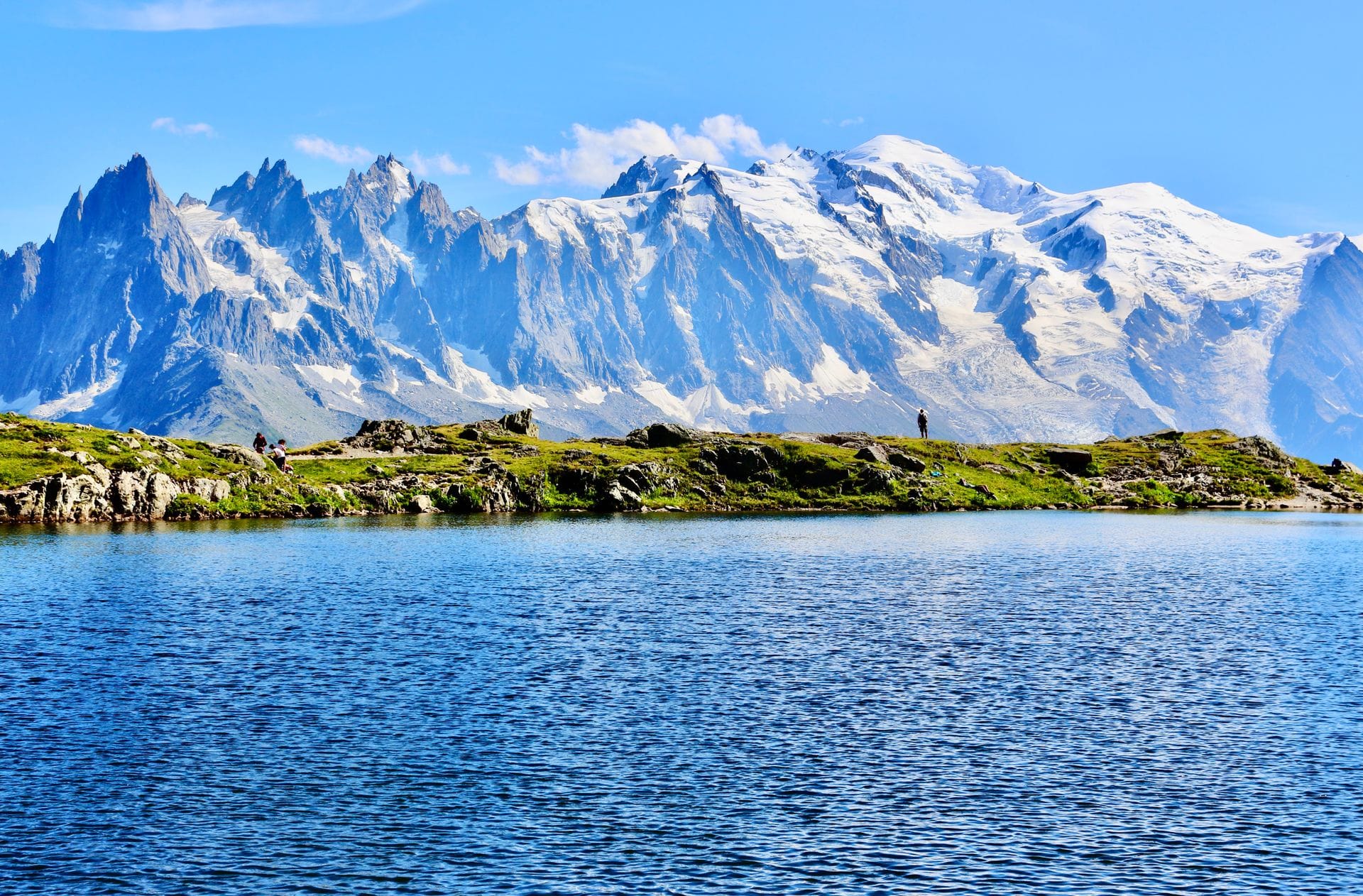 Snow-capped Mont Blanc reflected in a mountain lake near Chamonix in summer