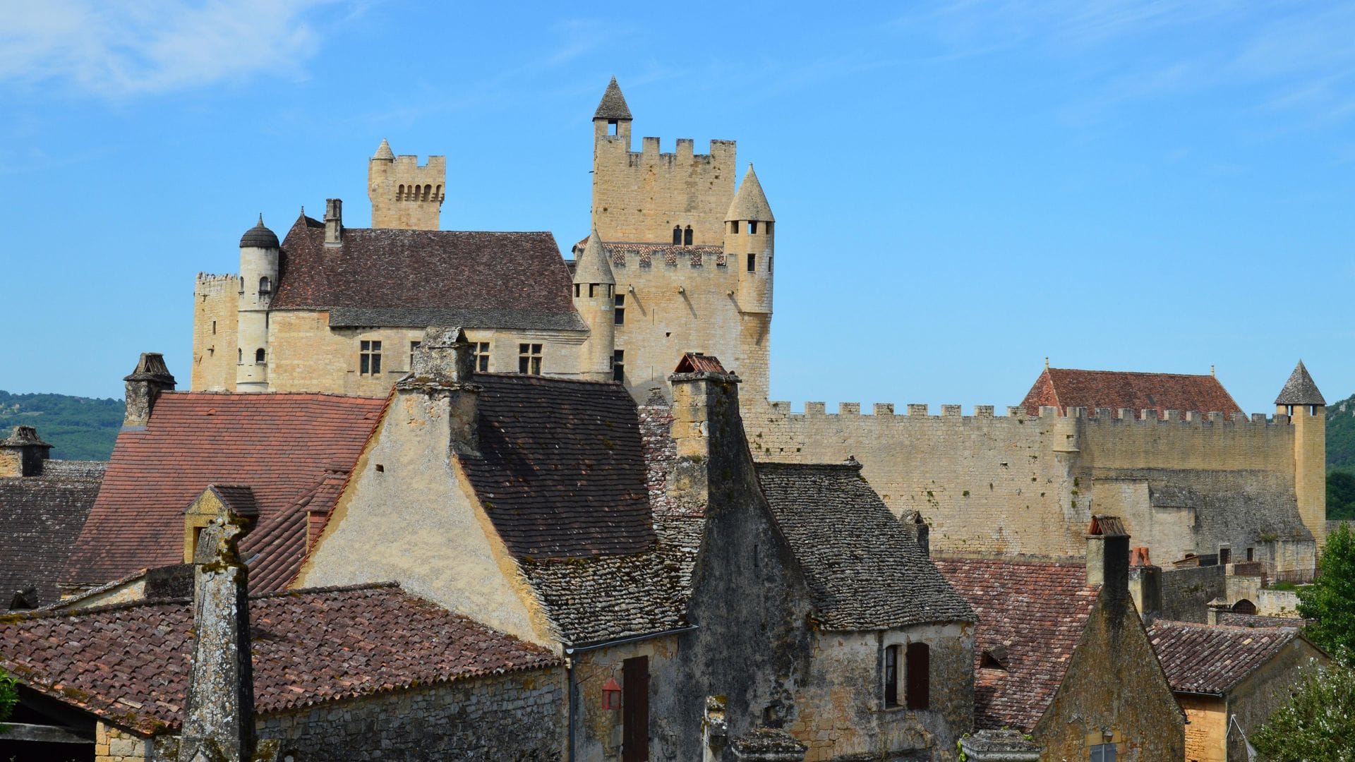 Chateau de Beynac's medieval towers rising above the Dordogne valley