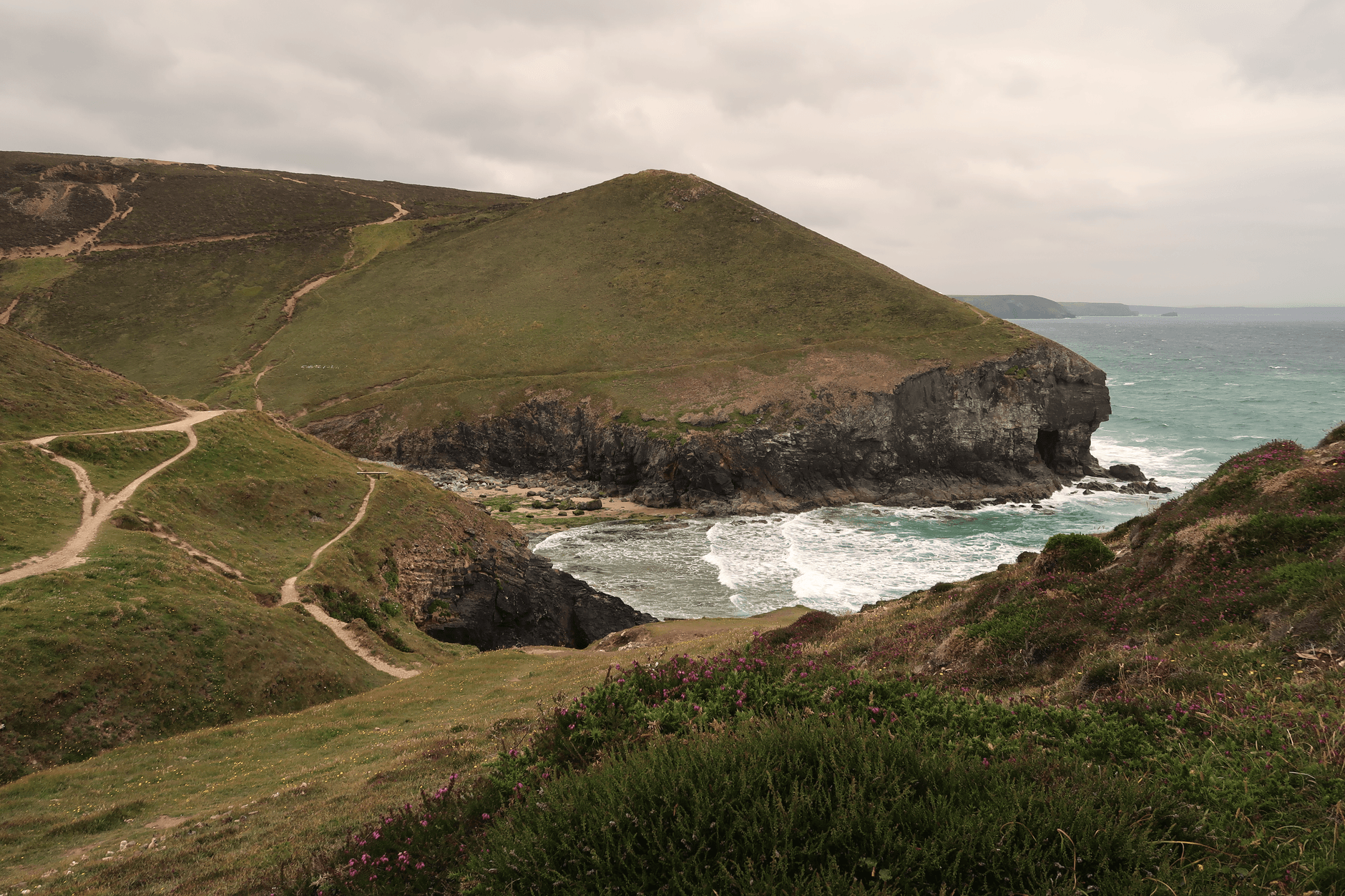 South West Coast Path cliffs and cove near St Agnes, Cornwall