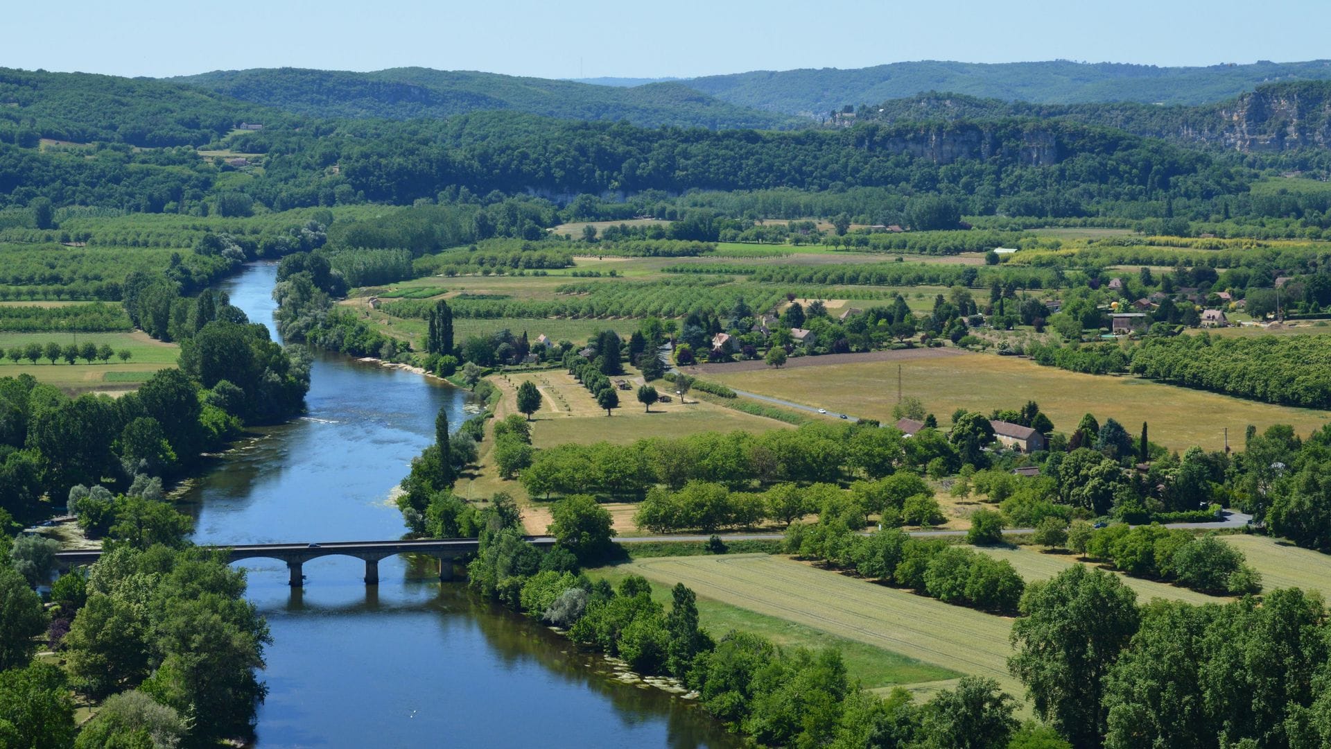 The Dordogne river winding through Perigord countryside near Bergerac