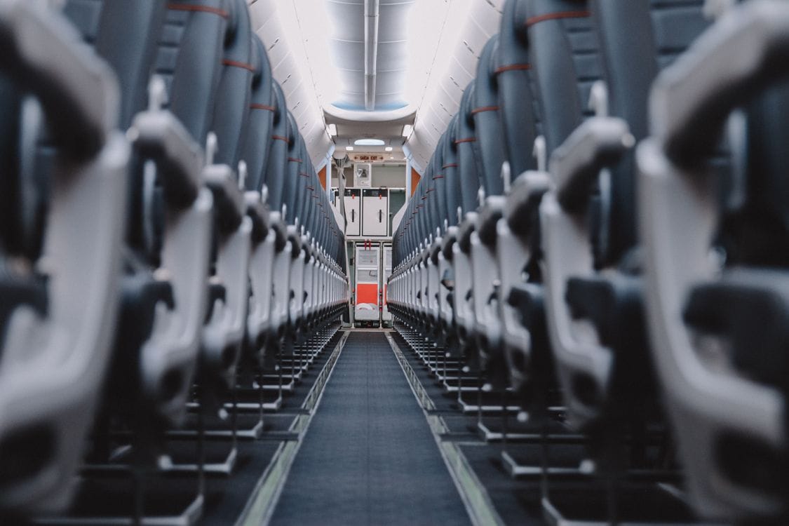 Economy class cabin aisle on a long-haul flight