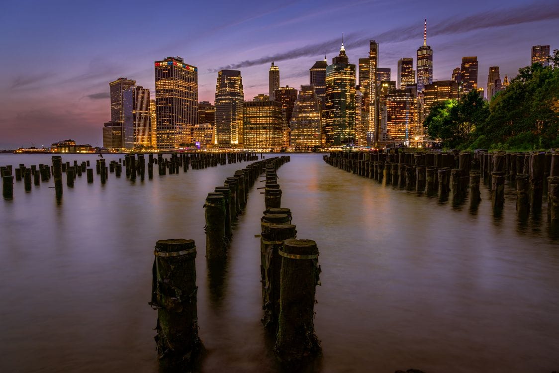 The Manhattan skyline in New York at dusk, one of the long-haul city breaks Expedia packages