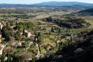 Aerial view of Gordes in the Luberon, the hilltop village that sets the scene for Provence on a budget