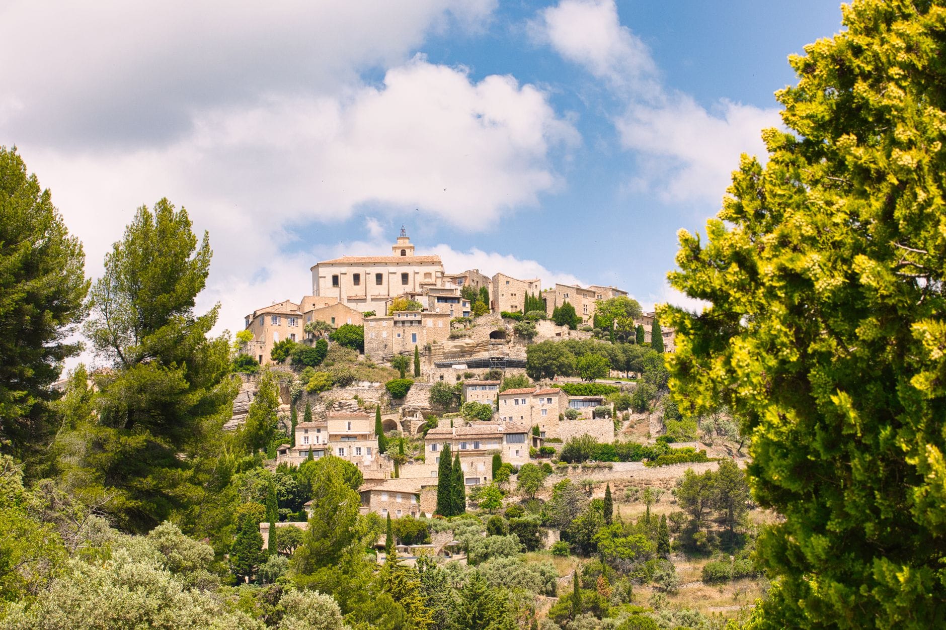 The medieval stone terraces of Gordes climbing a rocky outcrop in the Luberon