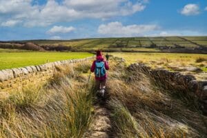 Hebden Bridge holiday guide: walkers on a Pennine footpath above Hebden Bridge, West Yorkshire