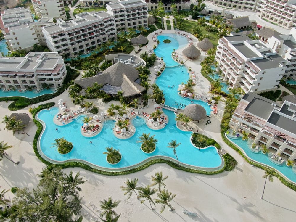 Aerial view of a resort pool complex, the kind of hotel included in a Jet2holidays package
