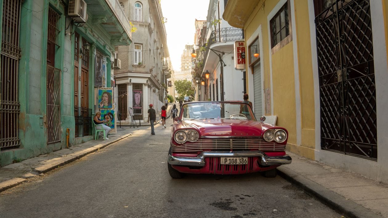 A classic car parked on a colourful street in Havana, Cuba, one of the long-haul destinations Logitravel packages through its Long Trips division