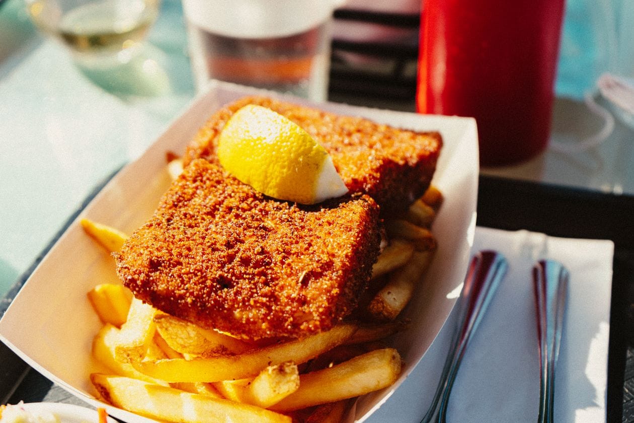 A classic fish and chips supper served with lemon, a Morecambe seafront staple