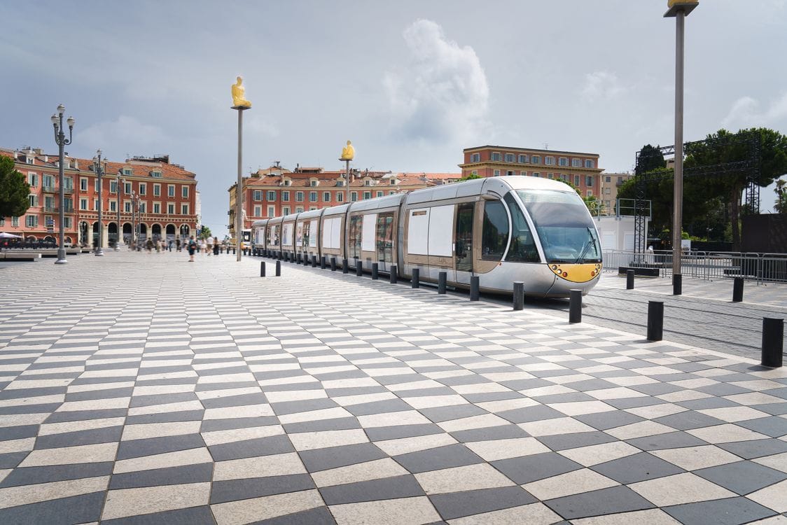 A modern tram in the centre of Nice, part of the Lignes d'Azur network