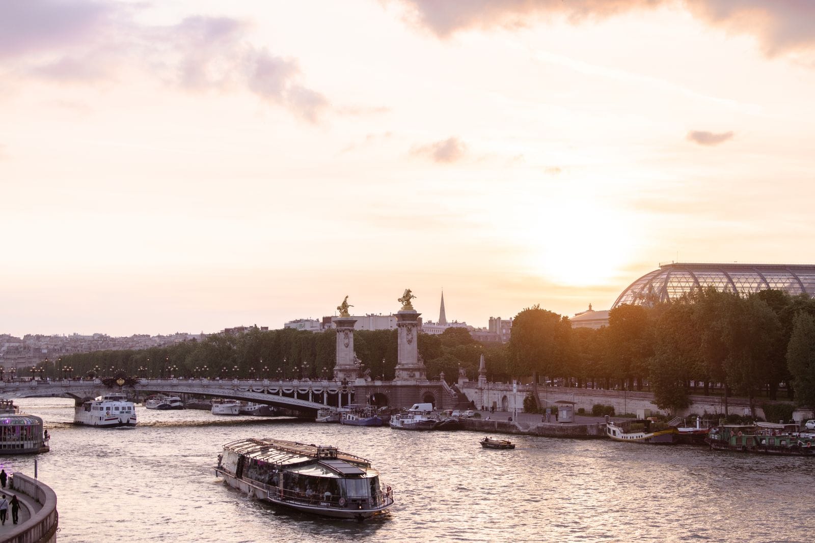 The Seine river and Parisian architecture at sunset