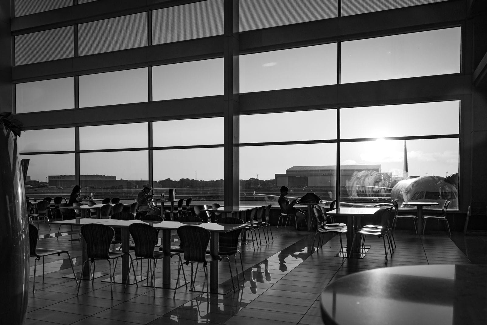 Priority Pass lounge interior with seating and natural light