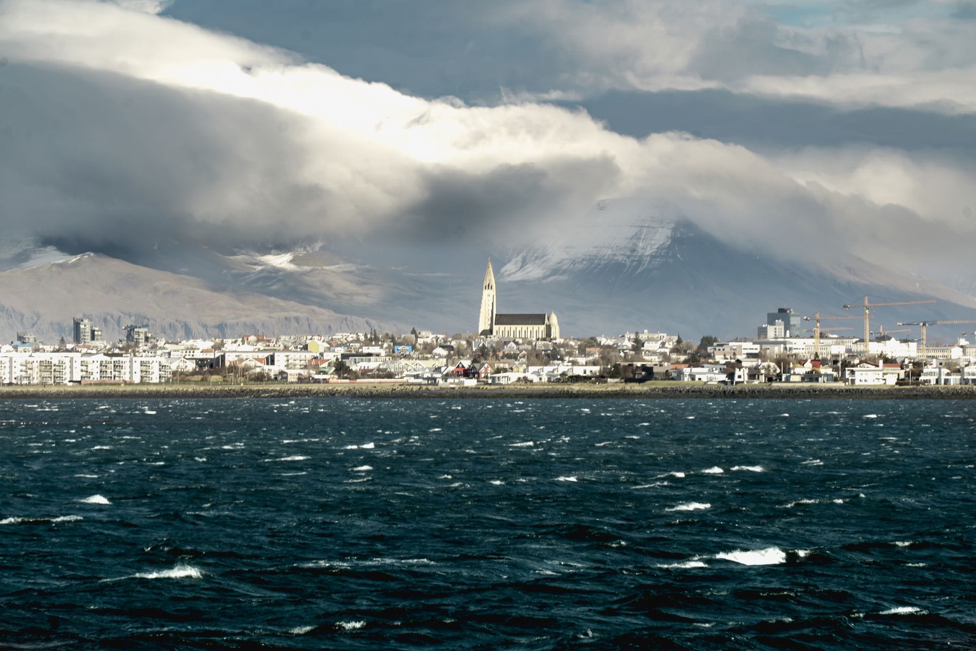 Reykjavik's skyline with Hallgrimskirkja church and the ocean beyond