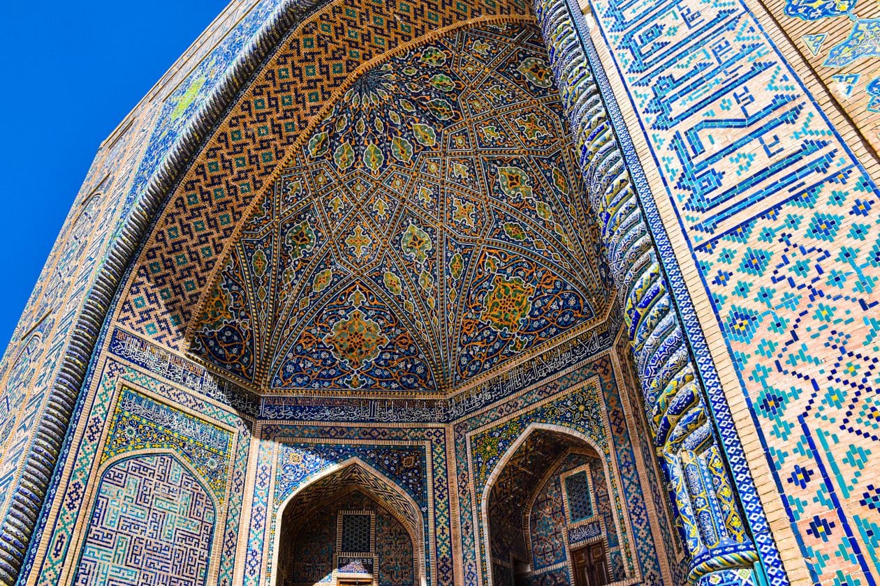 Ornate blue tilework inside a madrasa on Registan Square in Samarkand, Uzbekistan, one of the Silk Road destinations Exoticca packages