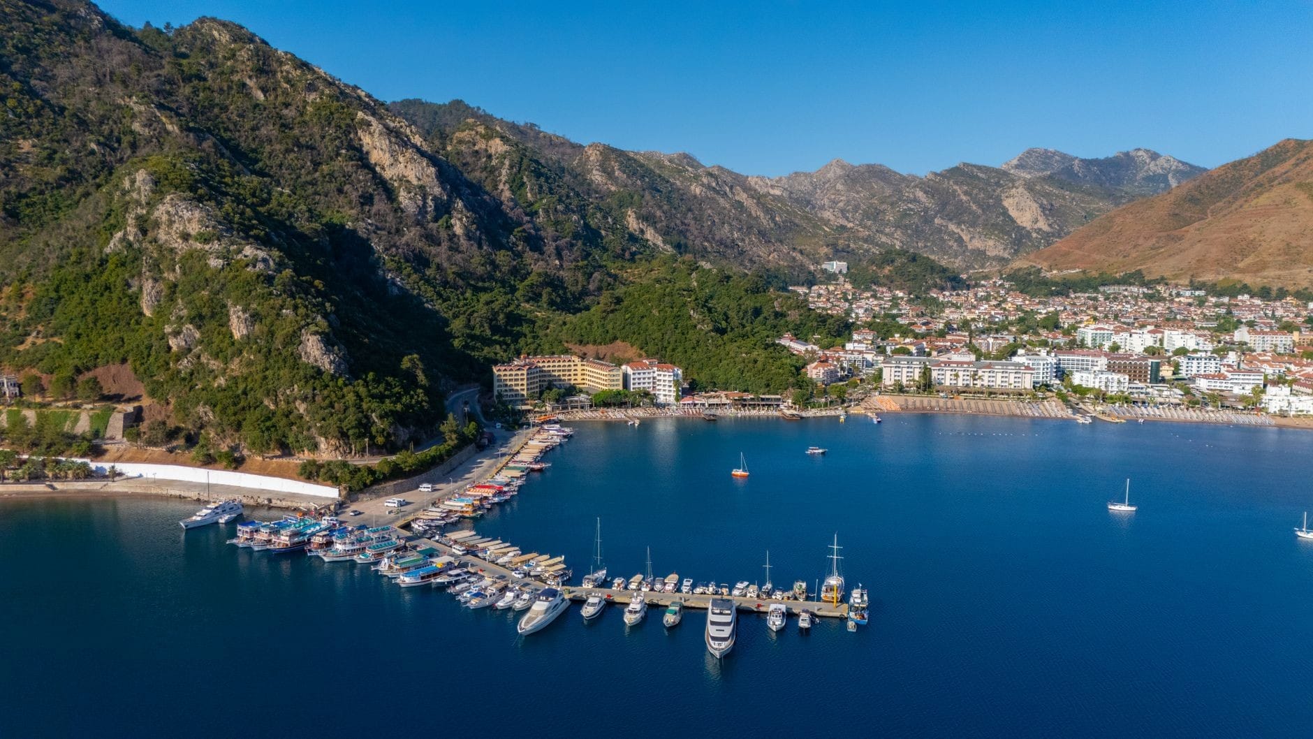 Aerial view of Marmaris marina and bay surrounded by mountains, Turkey