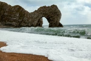 UK staycations 2026: Durdle Door on Dorset's Jurassic Coast, one of Britain's most iconic natural landmarks