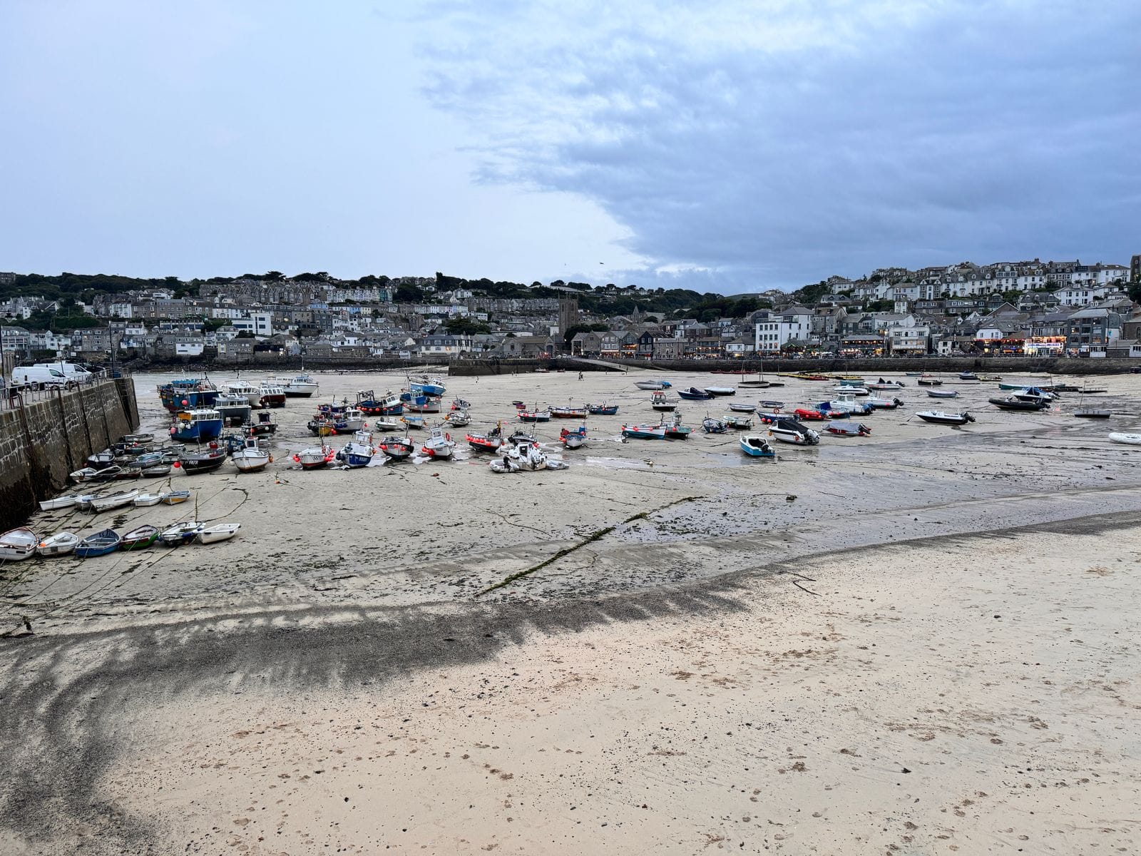 St Ives harbour in Cornwall with fishing boats at low tide
