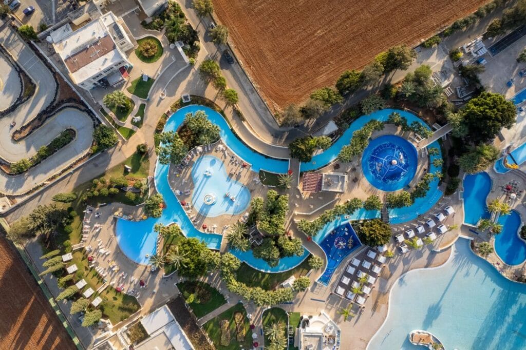 Aerial view of a resort swimming pool complex in Ayia Napa, Cyprus, the kind of spa and hotel deal Wowcher sells most