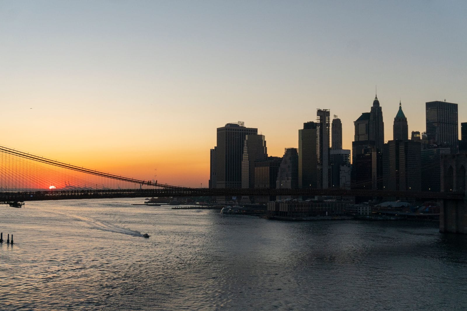Brooklyn Bridge and the Manhattan skyline at sunset