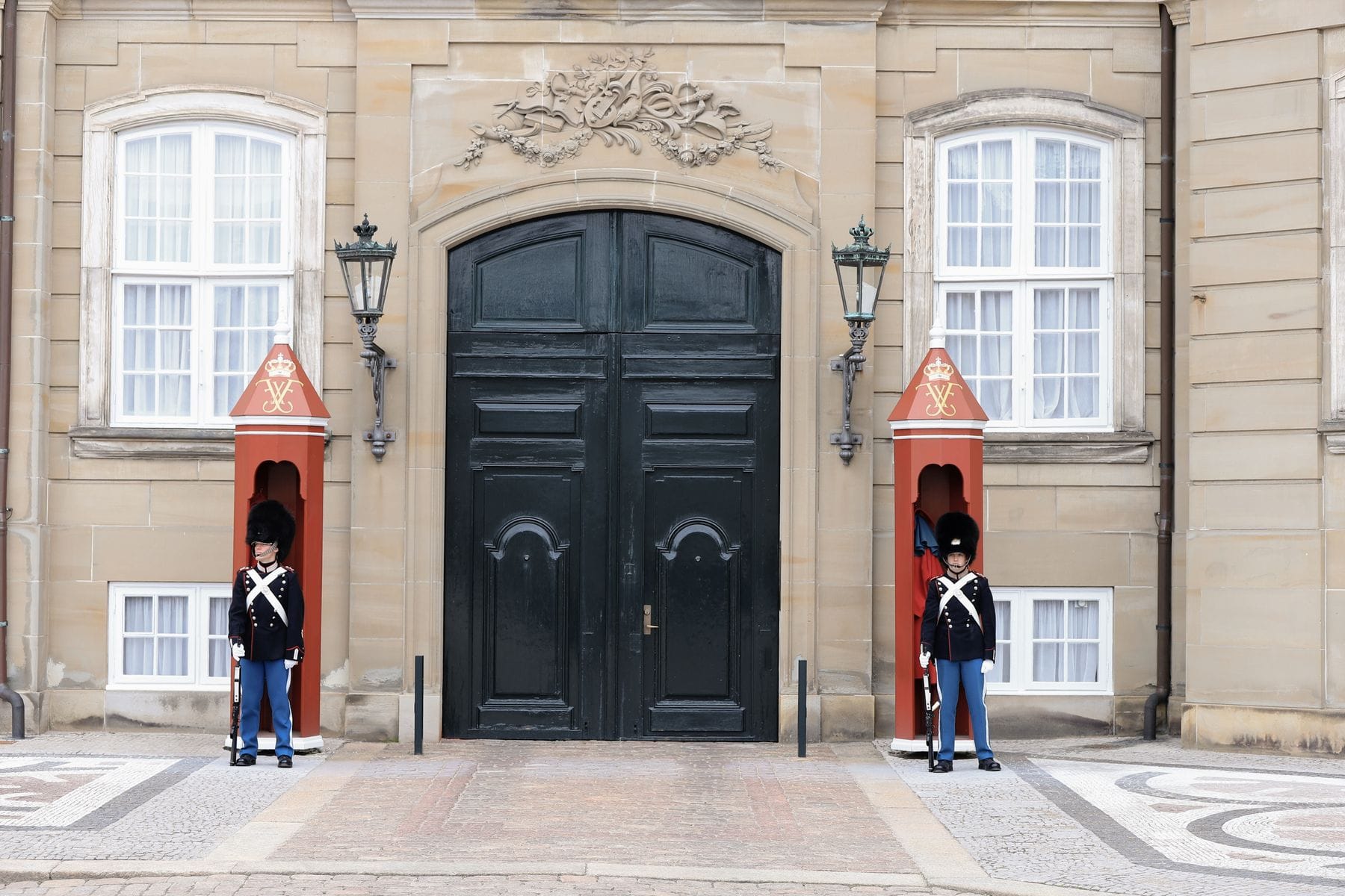 Royal Guards standing at attention outside Amalienborg Palace, Copenhagen