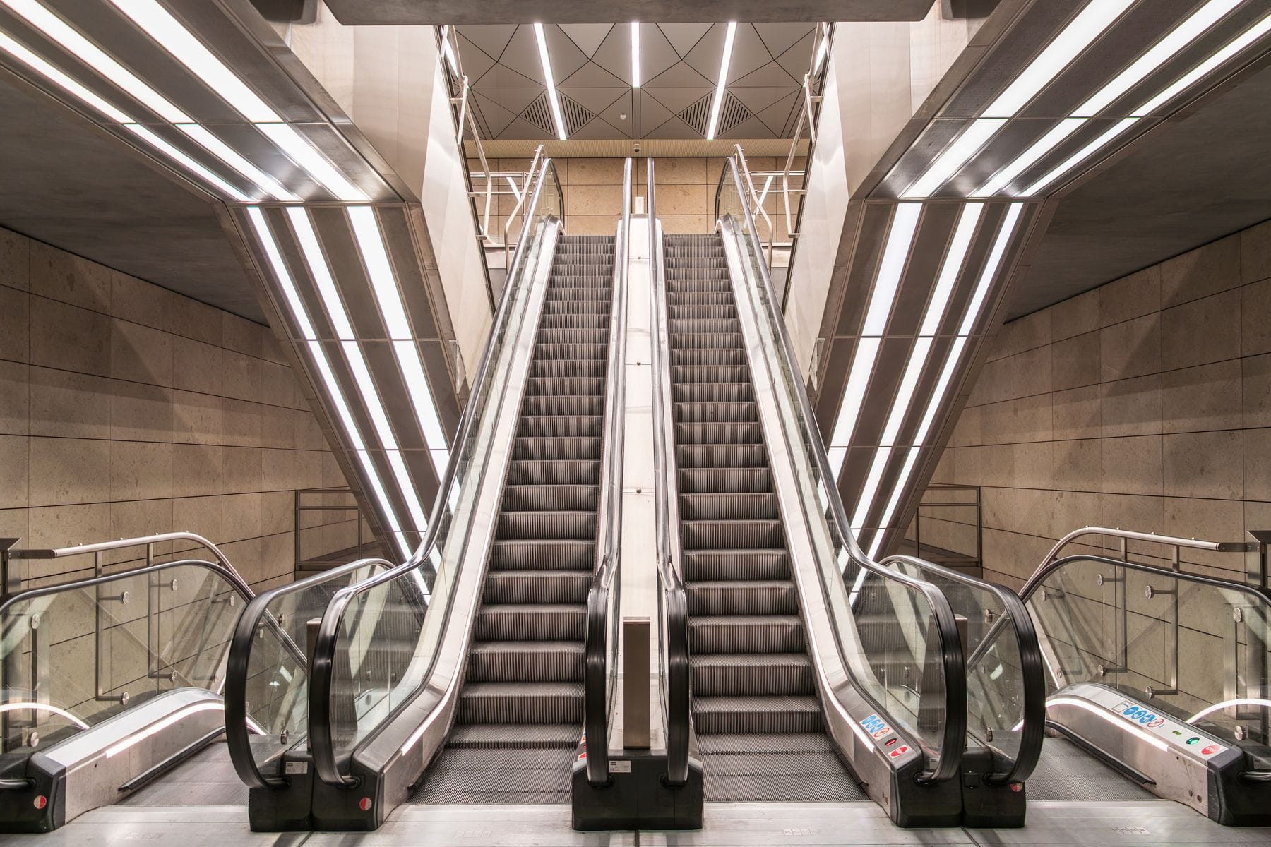 Escalators inside a modern Copenhagen Metro station