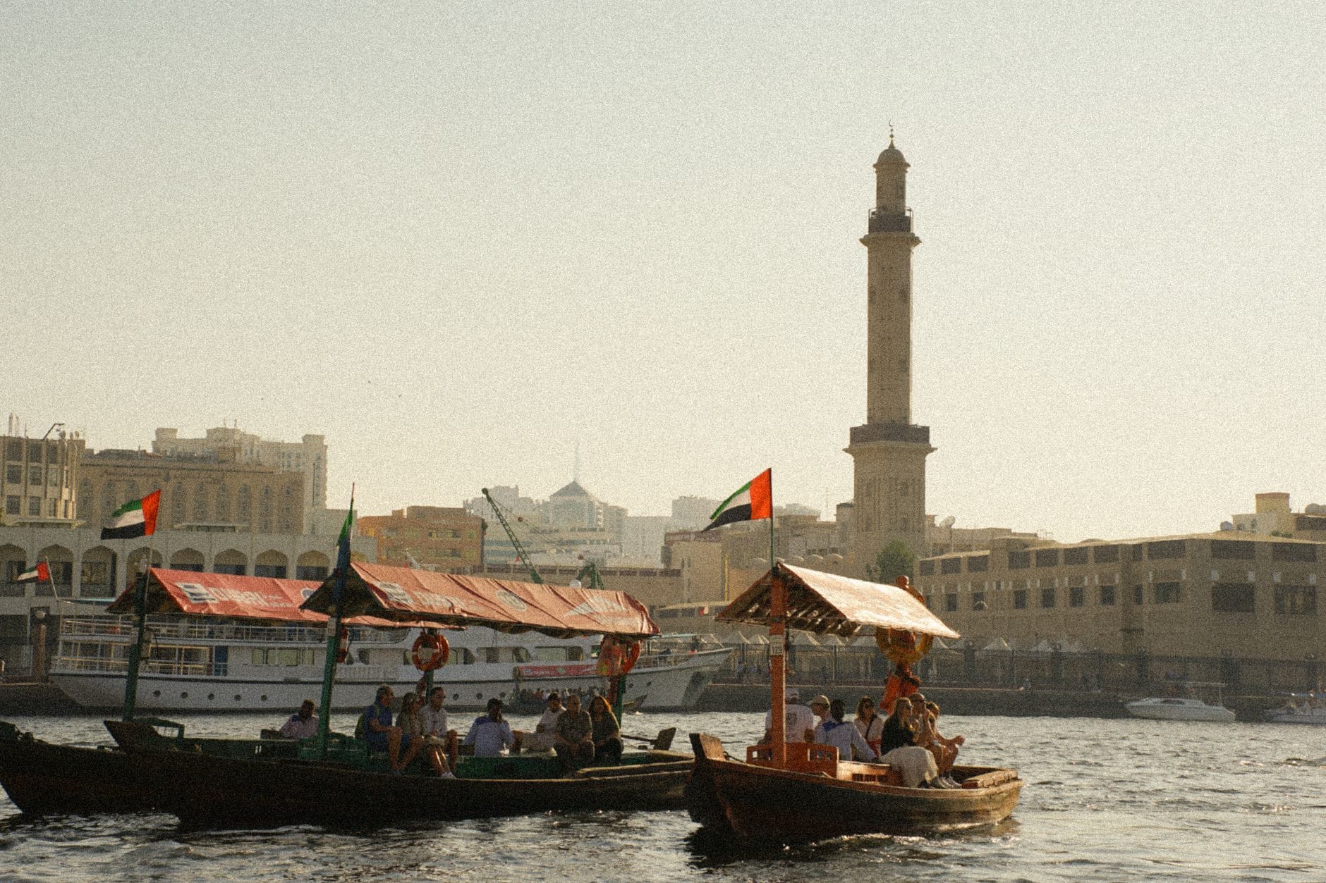 Traditional abra boats crossing Dubai Creek near the Deira souks