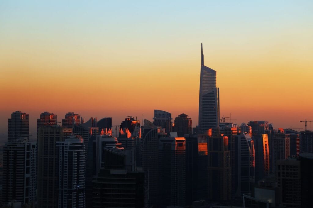 Dubai skyline at sunset from the water, the free view any Dubai on a budget trip still gets