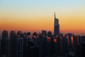 Dubai skyline at sunset from the water, the free view any Dubai on a budget trip still gets