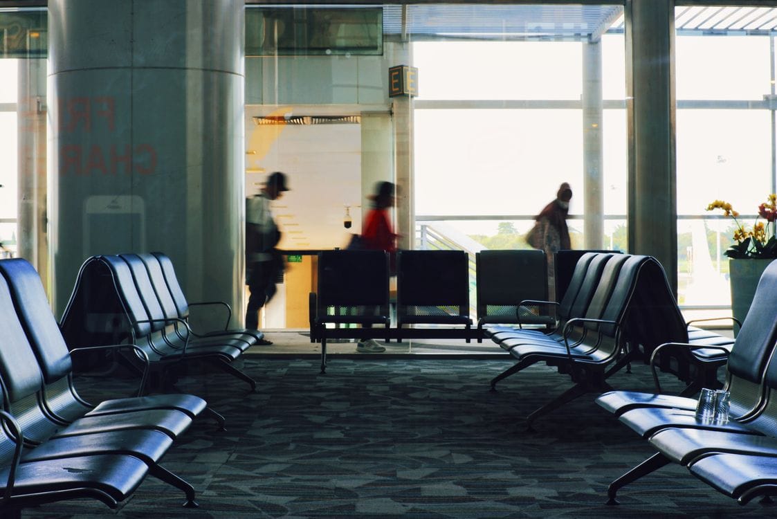 Airport terminal, deciding whether to pay the Jet2 name change fee or start a fresh booking