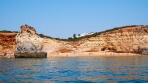 Algarve beach and cliffs in Faro District, Portugal