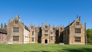 Warner Hotels sale: a grand English manor house with turrets and formal lawns