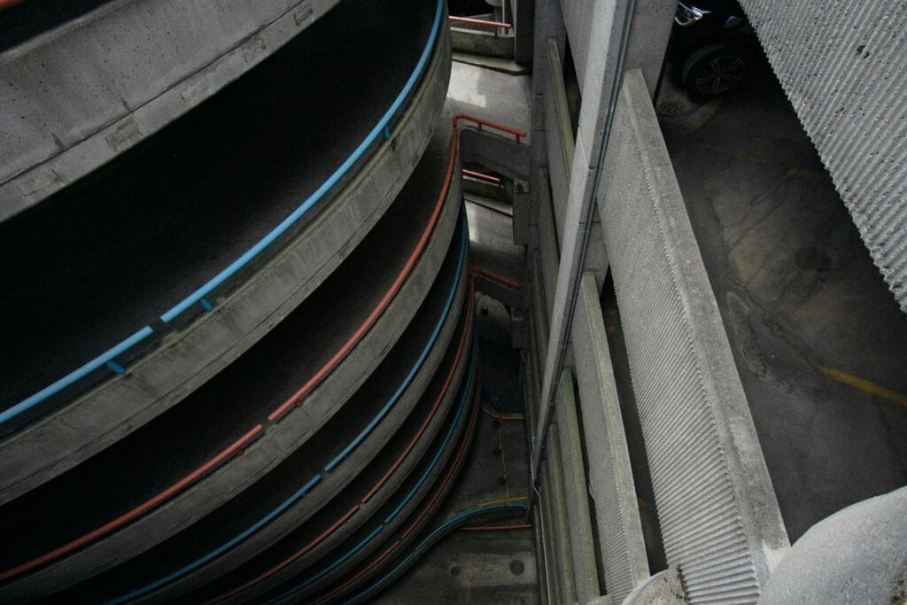 How far in advance to book airport parking: a spiral multi-storey car park seen from above