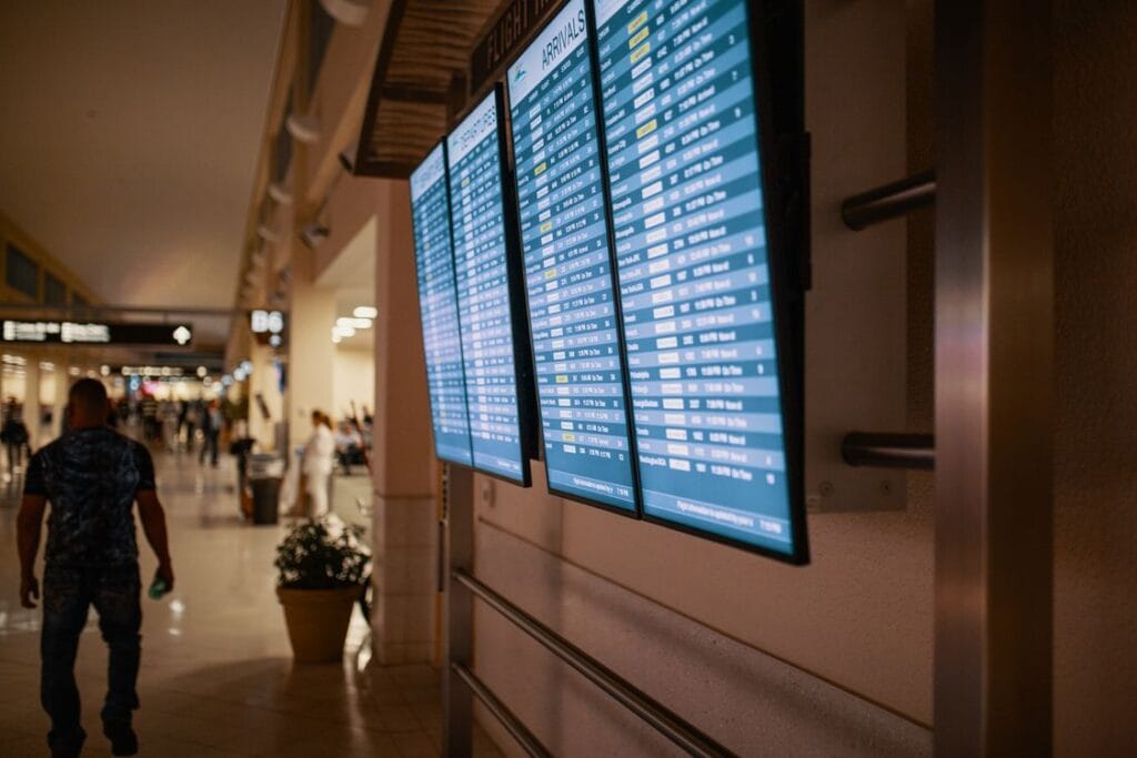 Do you need an eSIM for Europe: an airport departure board showing flights across the continent