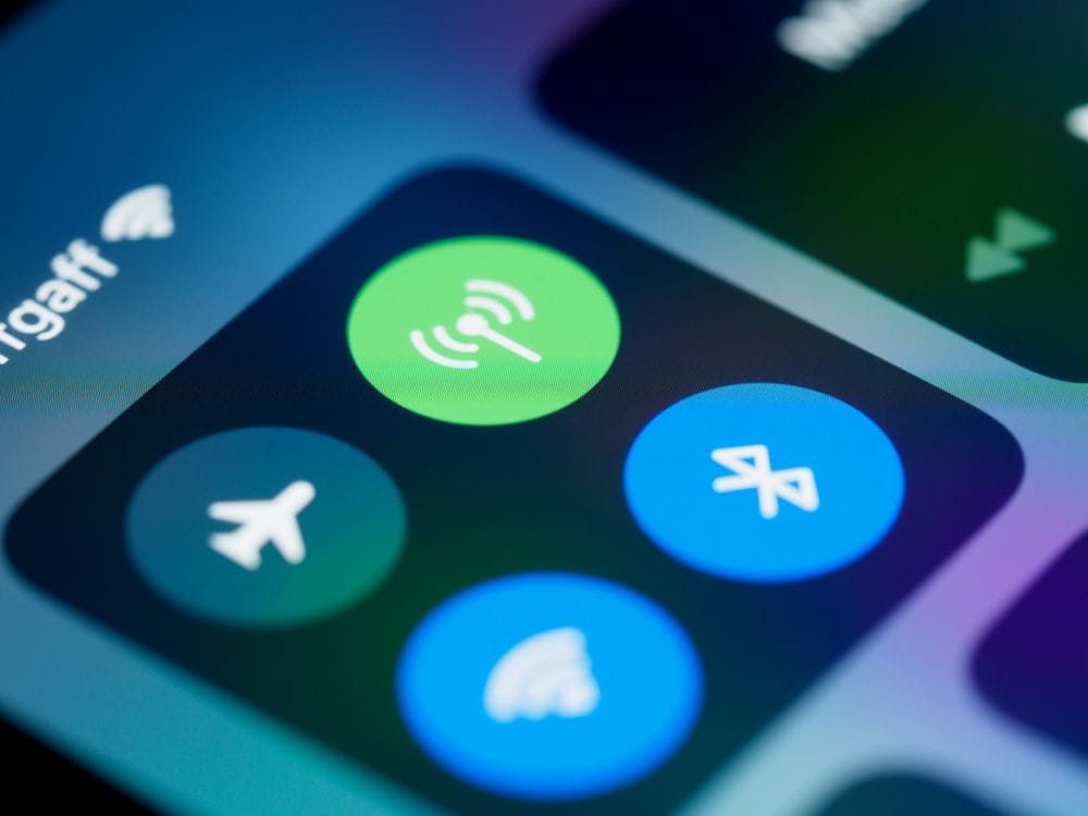 A smartphone's connectivity settings screen, where mobile data roaming can be switched off before you land