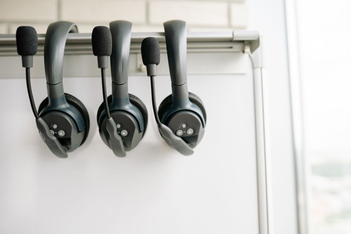 Three headsets hanging on a whiteboard rail, though Jet2 says it has no customer services phone line for complaints